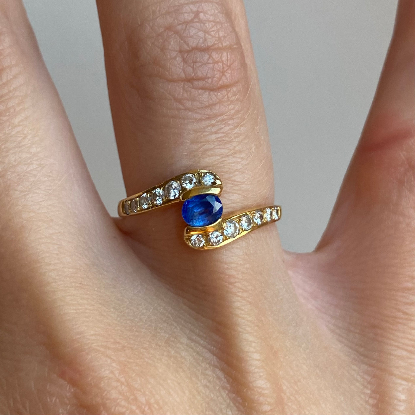 18ct Gold Diamond Arms Holding Sapphire Ring