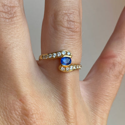 18ct Gold Diamond Arms Holding Sapphire Ring