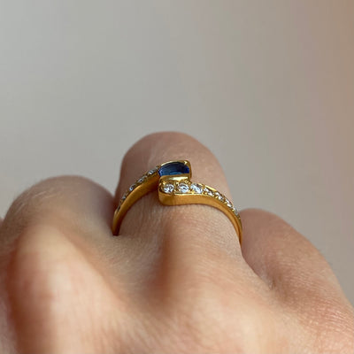 18ct Gold Diamond Arms Holding Sapphire Ring