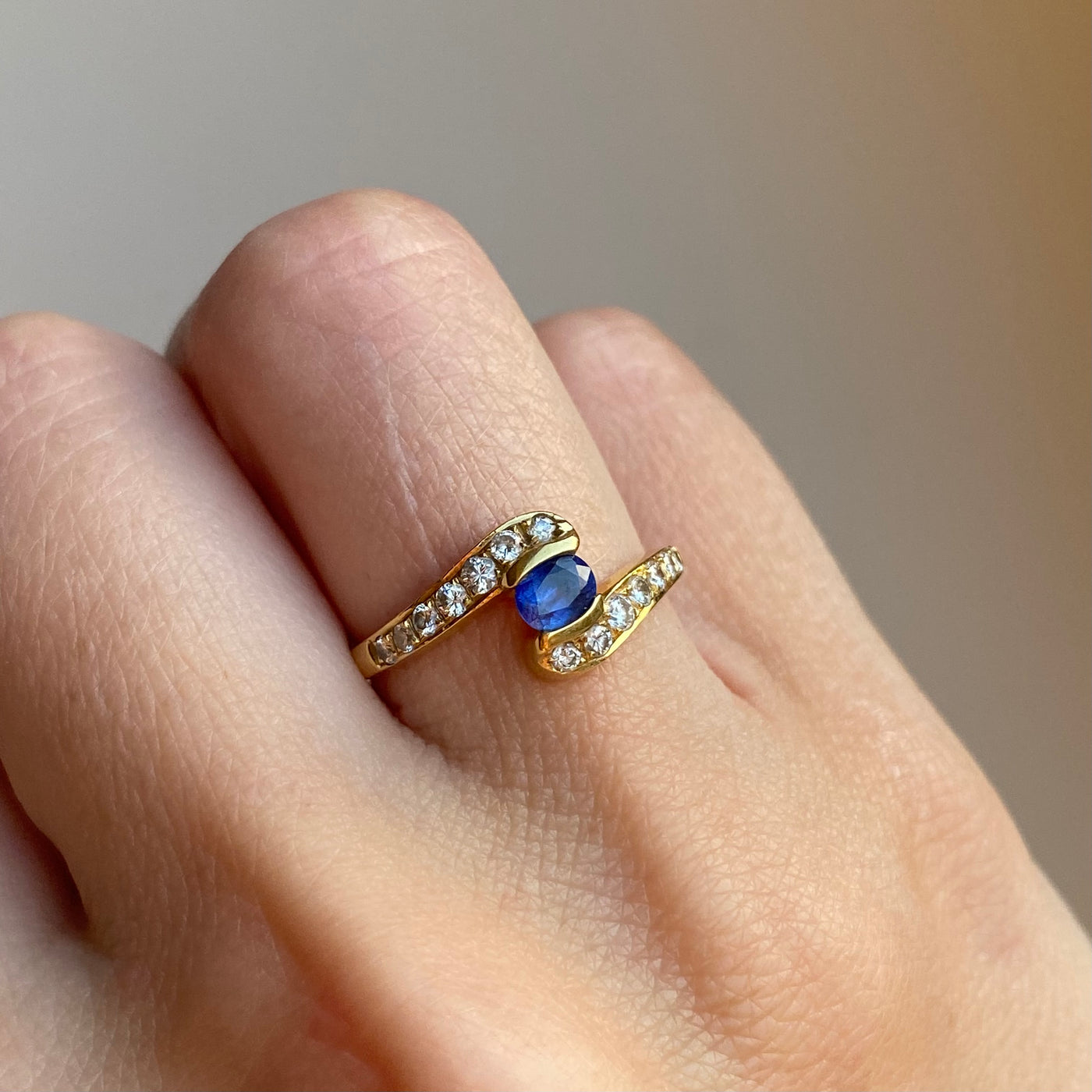 18ct Gold Diamond Arms Holding Sapphire Ring