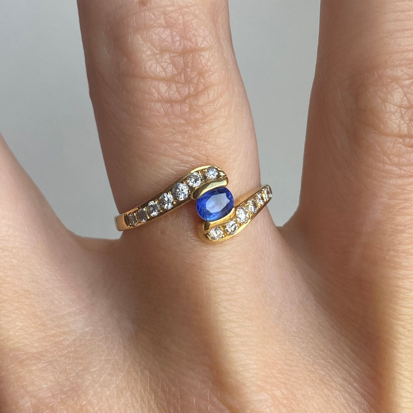 18ct Gold Diamond Arms Holding Sapphire Ring