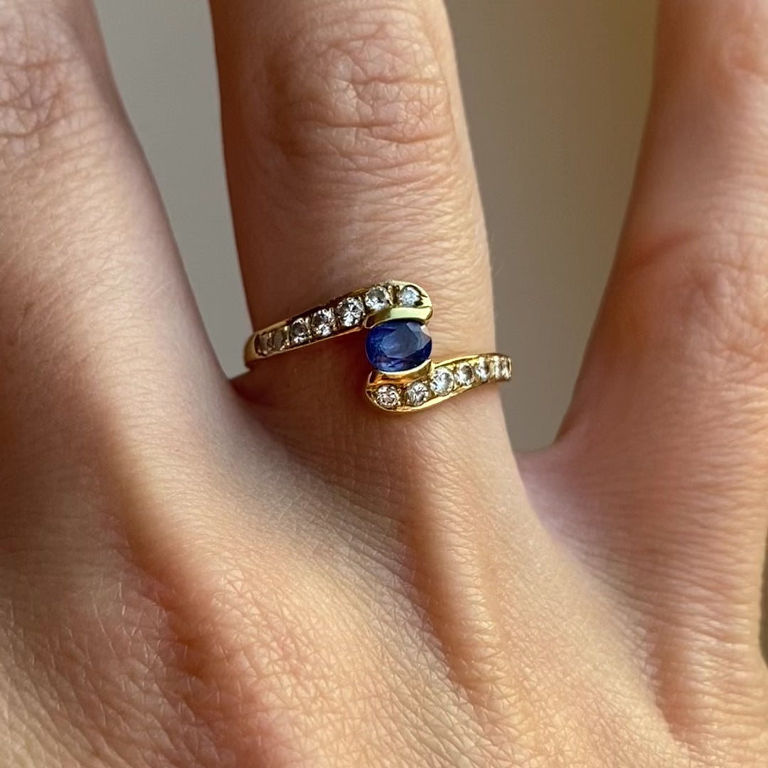 18ct Gold Diamond Arms Holding Sapphire Ring