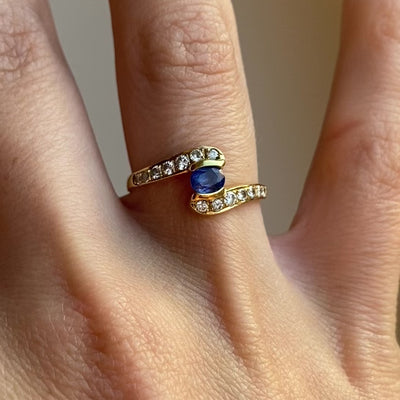 18ct Gold Diamond Arms Holding Sapphire Ring