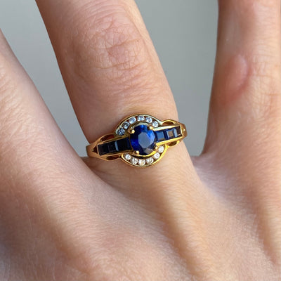 18ct Gold Swiss Sapphire and Diamond Halo Ring